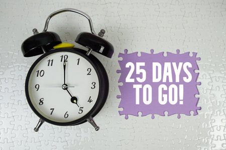25 Days To Go! text with alarm clock on purple backgroundの写真素材