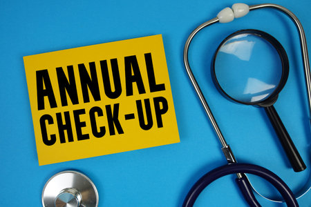 Annual Check-up text with Stethoscope on blue background