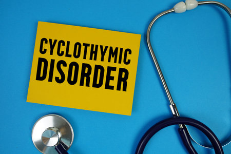Cyclothymic Disorder text with Stethoscope on blue background