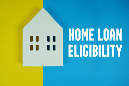 Home Loan Eligibility text with house models on blue backgroundの写真素材