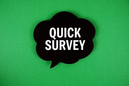 Quick Survey text with speech bubble on green backgroundの写真素材
