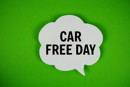 Car Free Day text with speech bubble on green backgroundの写真素材