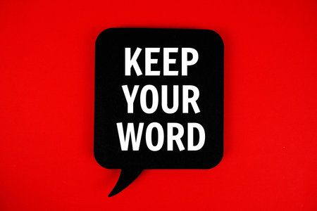 Keep Your Word text with speech bubble on red backgroundの写真素材