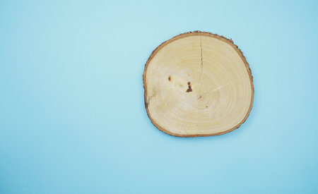 wooden podium product display stands flat lay on blue backgroundの写真素材