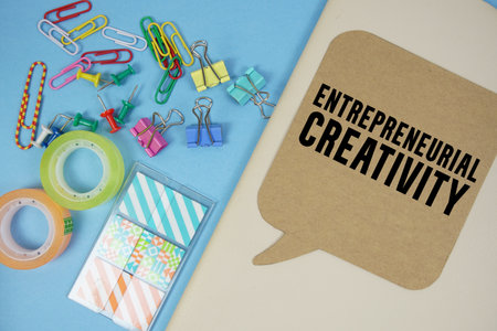 Entrepreneurial Creativity text with stationery on cover notebook backgroundの写真素材