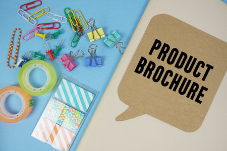 Product Brochure text with stationery on cover notebook background