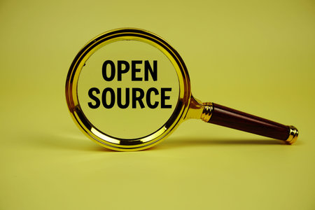 Open Source text with magnifying glass on yellow background