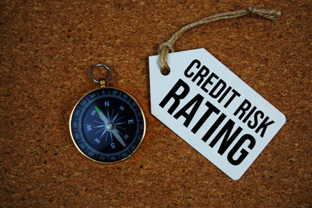 CRR Credit Risk Rating text on price tag with compass on cork board backgroundの写真素材