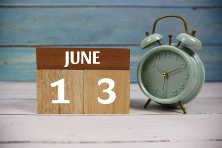 Wooden Calendar Showing the Date of June 13th. Day 13 of June Monthの写真素材