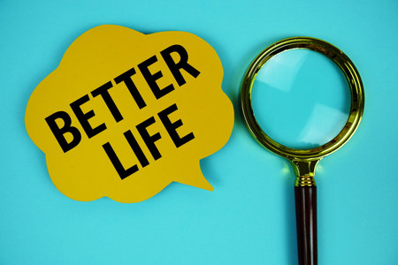 Better Life text with speech bubble and magnifying glass on blue backgroundの写真素材