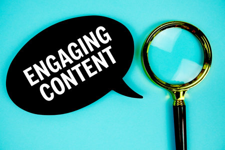Engaging Content text with speech bubble and magnifying glass on blue backgroundの写真素材