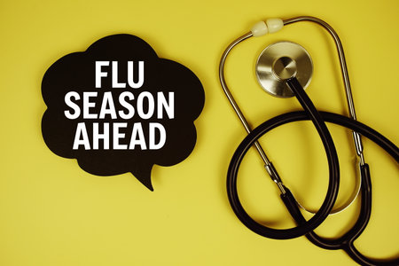 Flu Season Ahead text on speech bubble with stethoscope on yellow background, Healthy conceptの写真素材