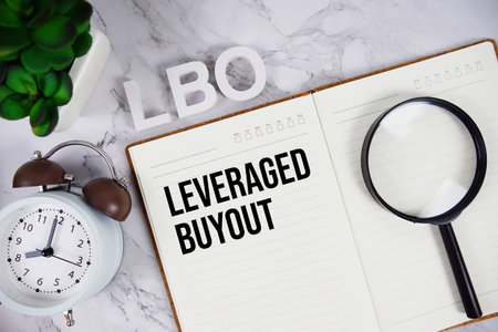 LBO - Leveraged Buyout acronym on notepad, Business concept backgroundの写真素材