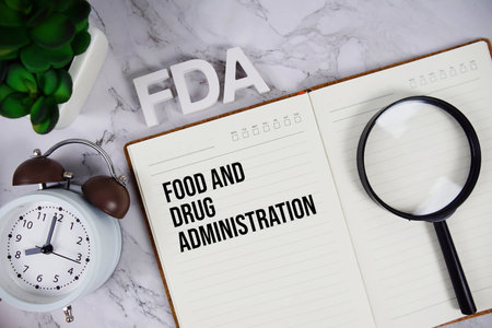 FDA - Food and Drug Administration acronym on notepad, Healthcare concept backgroundの写真素材