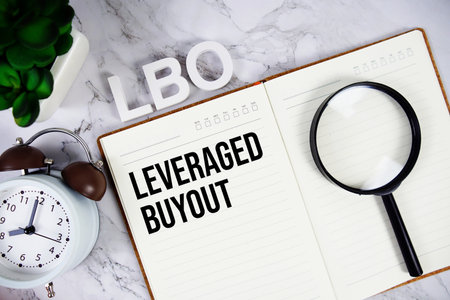 LBO - Leveraged Buyout acronym on notepad, Business concept backgroundの写真素材