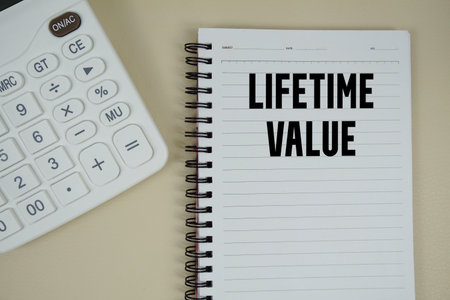 Lifetime Value text with calculator phrase of business and financial conceptの写真素材