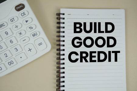 Build Good Credit text with calculator phrase of business and financial concept