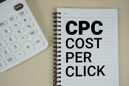 CPC Abbreviations of Cost per click text with calculator phrase of business and financial concept