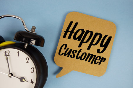 Happy Customer text with alarm clock on blue backgroundの写真素材