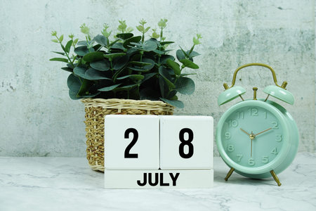Wooden Calendar Showing the Date of July 28th. Day 28 of July month
