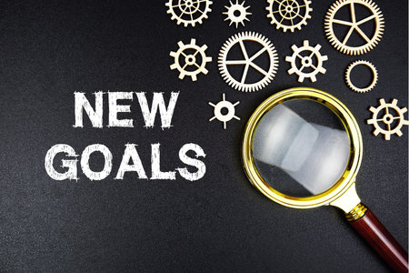 New Goals text message with magnifying glass on black backgroundの写真素材