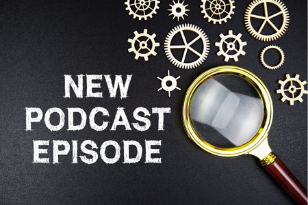 New Poscast Episode text message with magnifying glass on black backgroundの写真素材