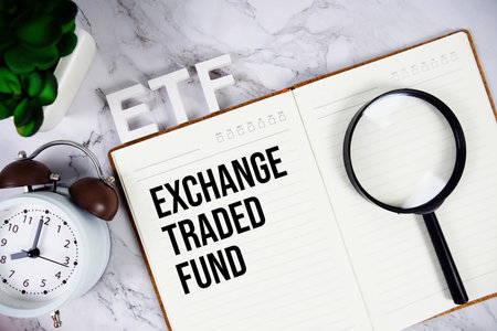 ETF - Exchange Traded Fund acronym on notepad, Business concept backgroundの写真素材