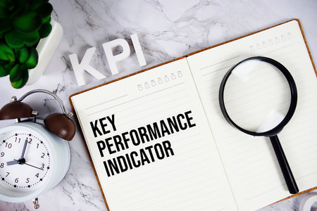 KPI - Key Performance Indicator acronym on notepad, Business concept backgroundの写真素材