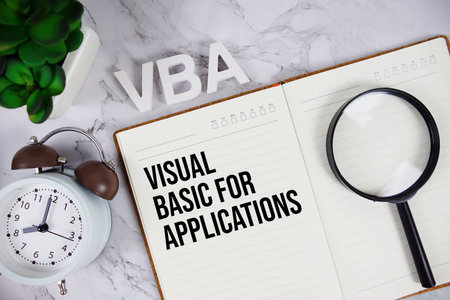 VBA - Visual Basic for Applications acronym on notepad, Financial concept background