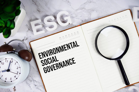 ESG - Environmental Social Governance acronym on notepad, Business concept background