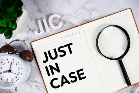 JIC - Just In Case acronym on notepad, Business concept backgroundの写真素材