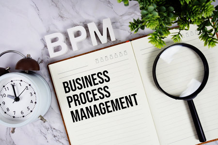 BPM - Business Process Management acronym on notepad, Business concept backgroundの写真素材
