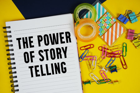 The Power Of Storytelling text with stationery on yellow backgroundの写真素材