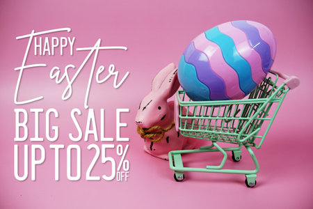 Easter Sale 25% promotion with Easter Egg and rabbits decorations concept on pink backgroundの写真素材
