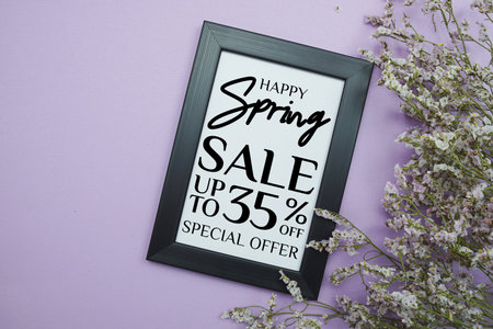 Spring Sale 35% Promotion and Marketing with flowers bouquet decoration on purple backgroundの写真素材