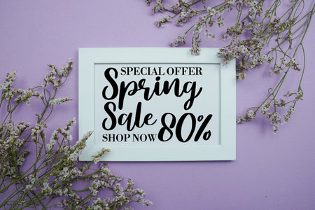 Spring Sale 80% Promotion and Marketing with flowers bouquet decoration on purple backgroundの写真素材
