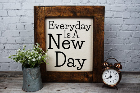 Everyday Is A New Day Motivational and Inspirational quotes on wooden backgroundの写真素材