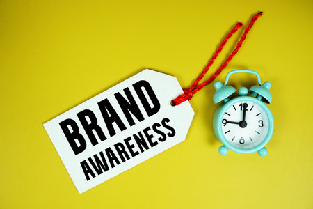 Brand Awareness text price tag label with alarm clock Promotion shopping conceptの写真素材