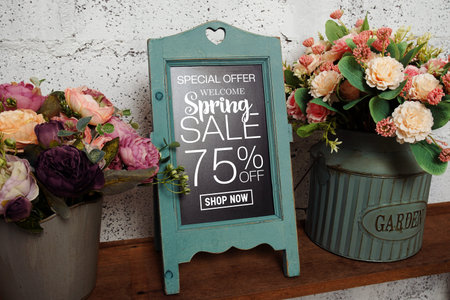 Spring Sale 75% Promotion and Marketing with easel with flowers bouquet decoration