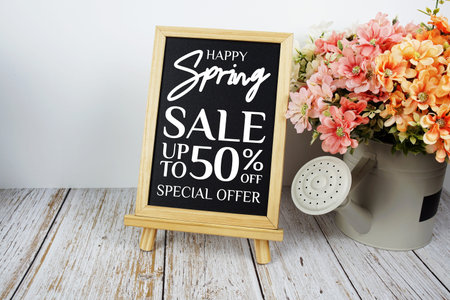 Spring Sale 50% Promotion and Marketing with easel with flowers bouquet decoration