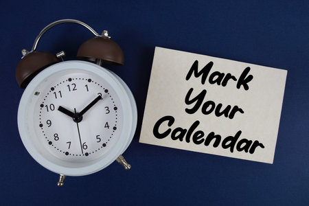 Mark Your Calendar text with alarm clock on blue background