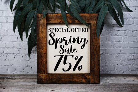 Spring Sale 75% Promotion and Marketing on wooden background