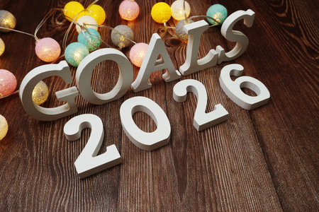 Goals for 2026 alphabet letter with LED cotton balls on wooden background