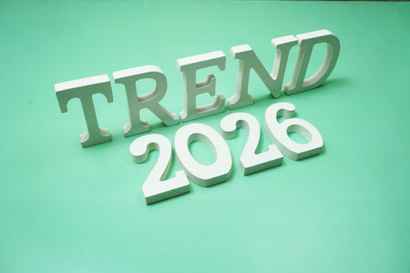 Trend 2026 alphabet letter on green background