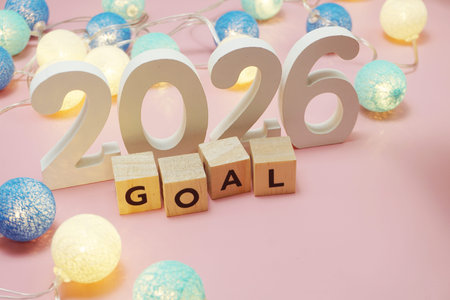 Goal 2026 word alphabet letters on pink background