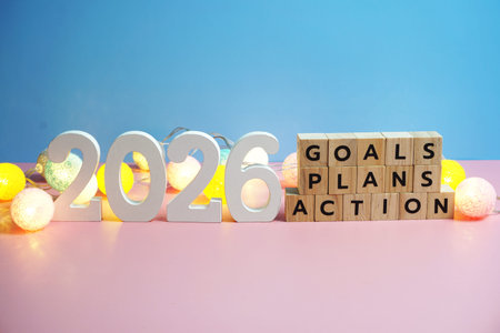 2026 new year goals, plan, action alphabet letters on blue and pink background