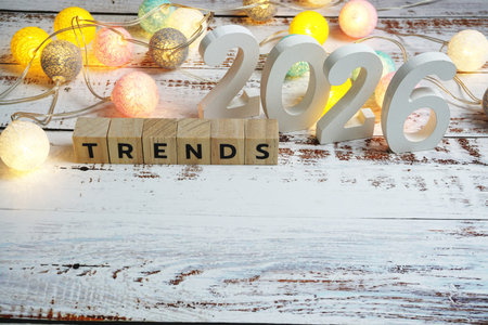 Trends 2026 word alphabet letters on wooden background