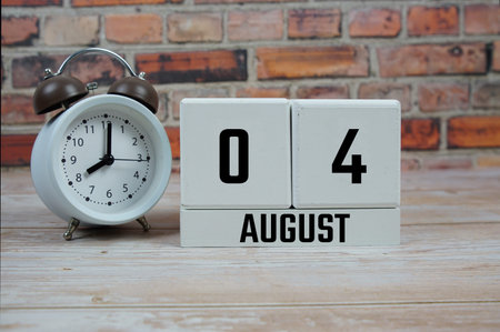 Wooden Calendar Showing the Date of August 4th. Day 4 of August month