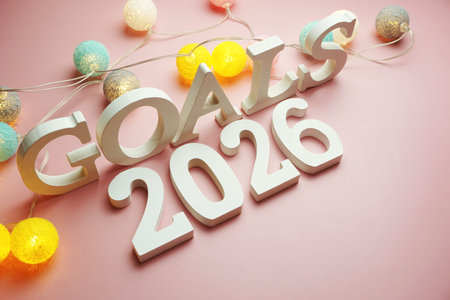 Golas 2026 alphabet letter with cotton ball LED decoration on pink background