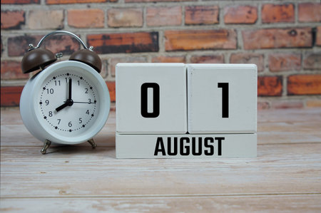 Wooden Calendar Showing the Date of August 1st. Day 1 of August month